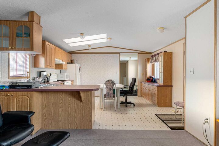 Property Photo:  104 Cree Road  AB T9K 1X3 