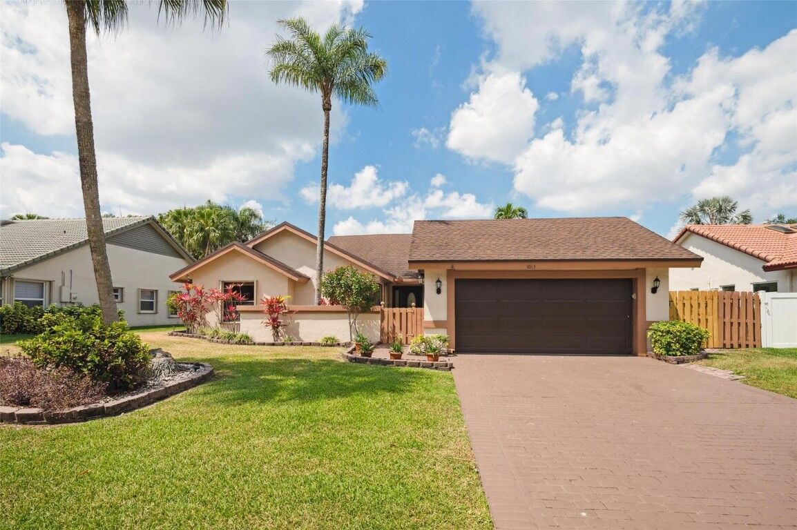 Property Photo:  1013 NW 99th Avenue  FL 33322 