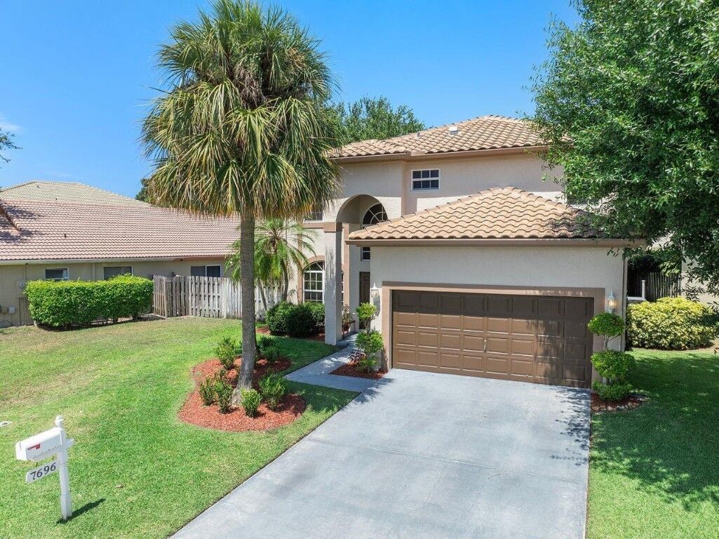 Property Photo:  7696 Northtree Way  FL 33467 