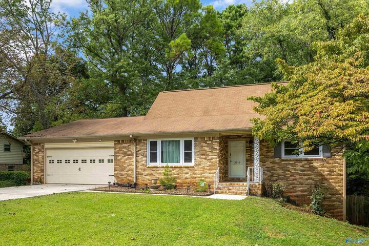 Property Photo:  2818 NW Brett Road  AL 35810 