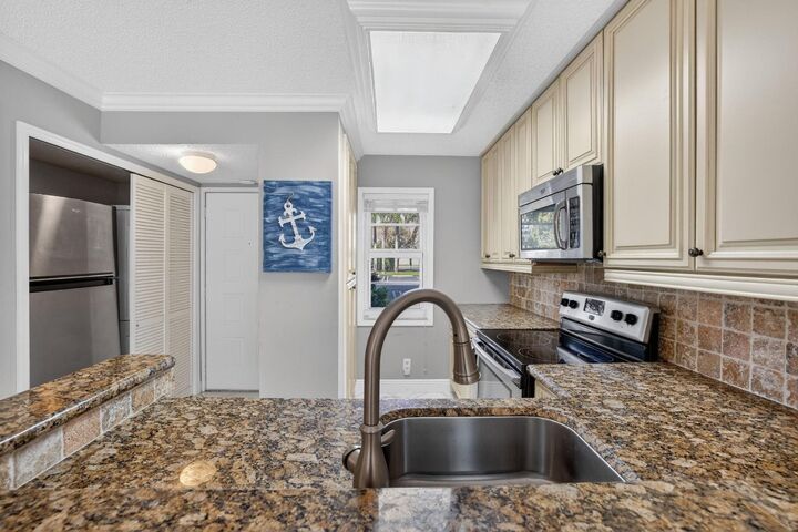 Property Photo:  2230 N Cypress Bend Drive 108  FL 33069 