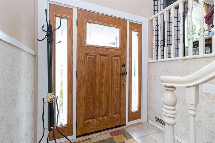 Property Photo:  8022 Galbraith Cres  BC V8M 1K4 