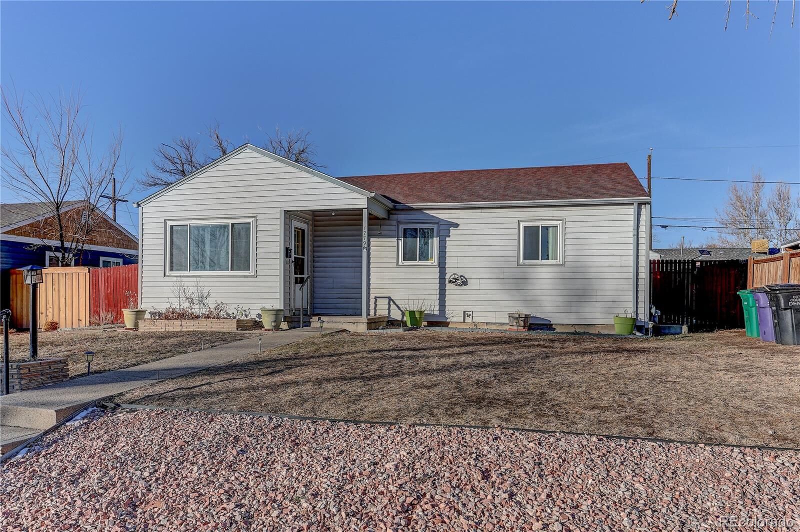 Property Photo:  1279 S Raritan Street  CO 80223 