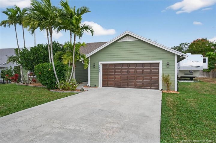 Property Photo:  9275 SE Mercury Street  FL 33455 