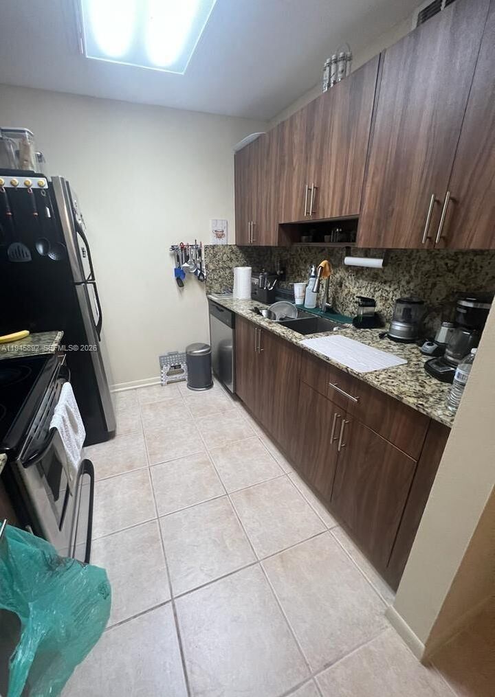 Property Photo:  1551 SW 135th Ter 107G  FL 33027 