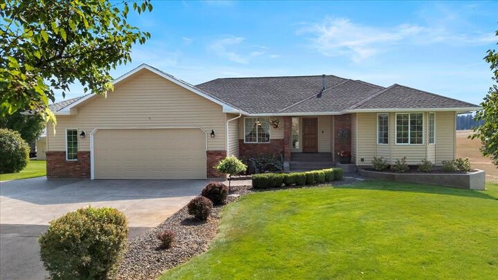 Property Photo:  304 E Burk Rd  WA 99005 