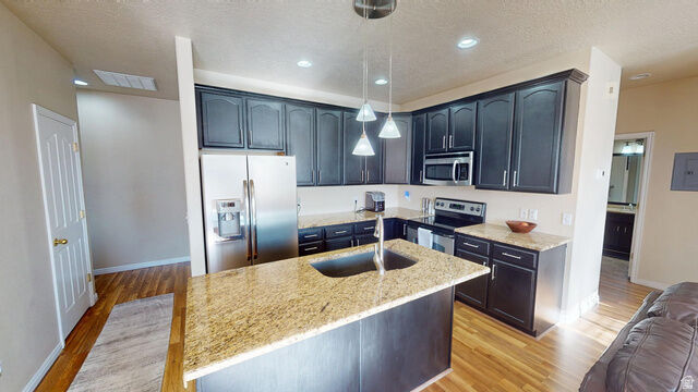 Property Photo: 6986 W Harlech Ln UT 84128