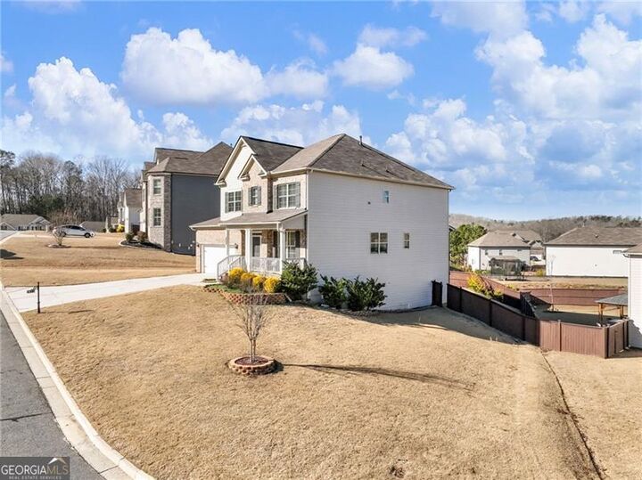 Property Photo:  7655 Farrow Pass Circle  GA 30028 