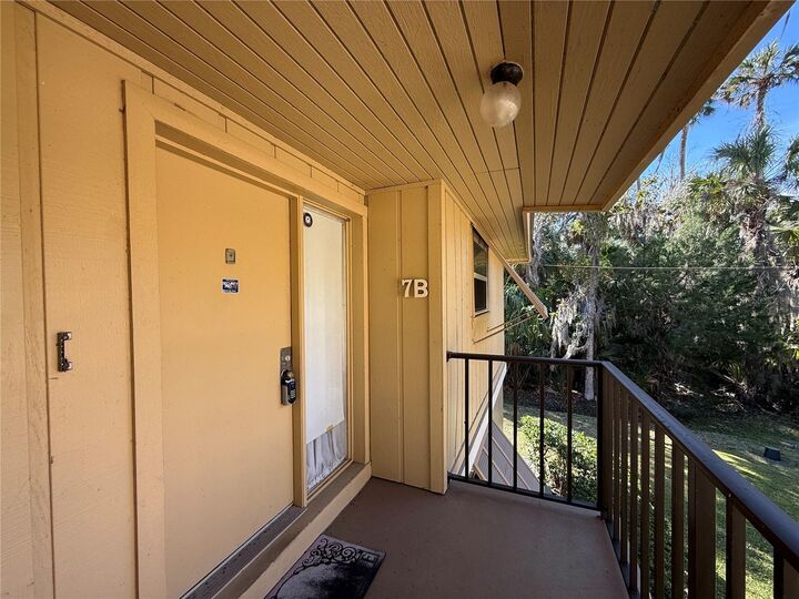 Property Photo:  130 Jasmine Woods Court 7B  FL 32725 