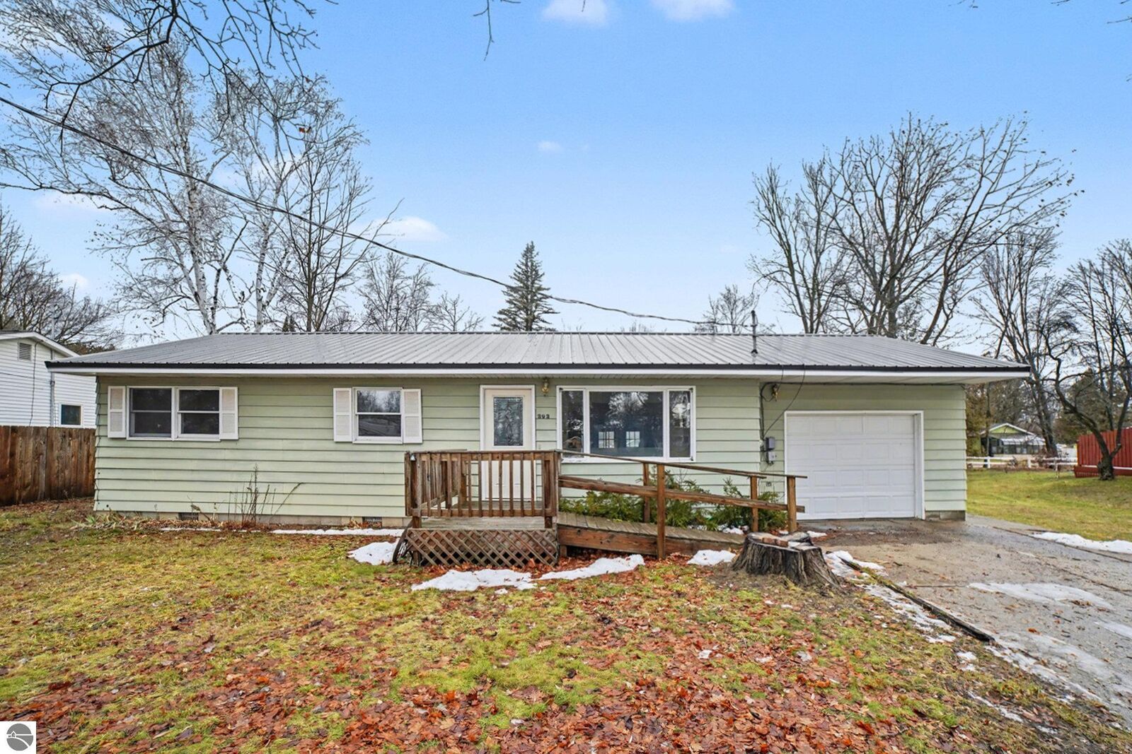 Property Photo:  303 Orchard Avenue  MI 48617 