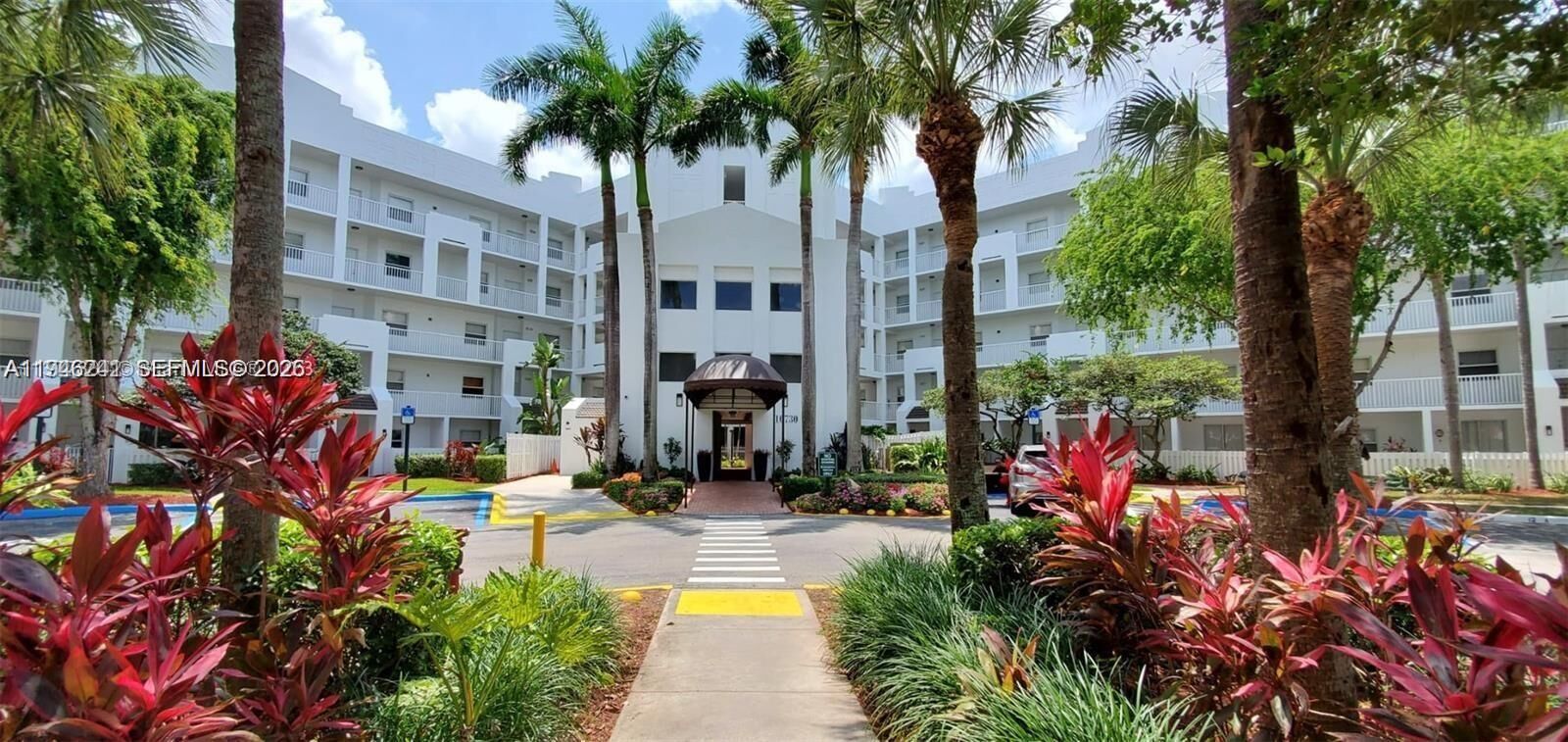 Property Photo:  10730 NW 66th St 411  FL 33178 