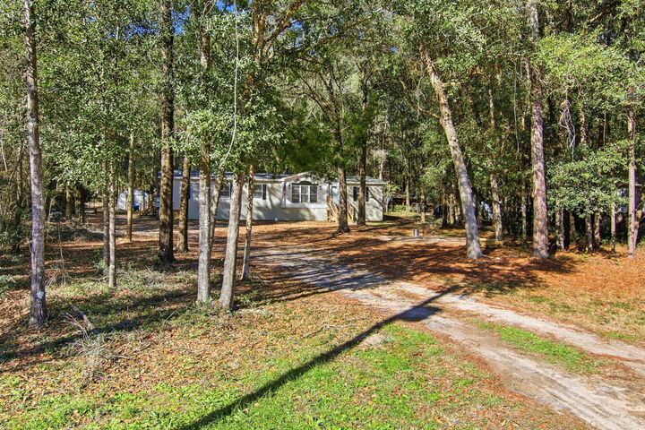 Property Photo:  6108 Old River Road  FL 32531 