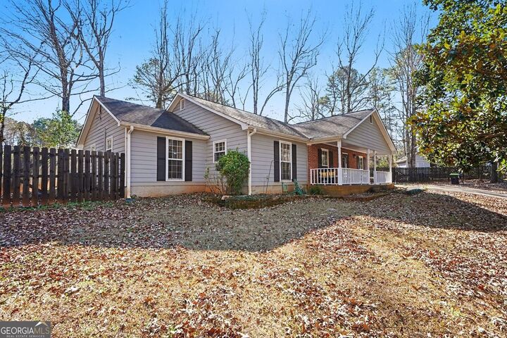 Property Photo:  8671 Twin Oaks Drive  GA 30236 