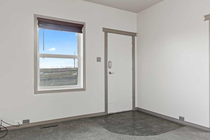 Photo de la propriété: 201 1 Street S AB T0L 1L0