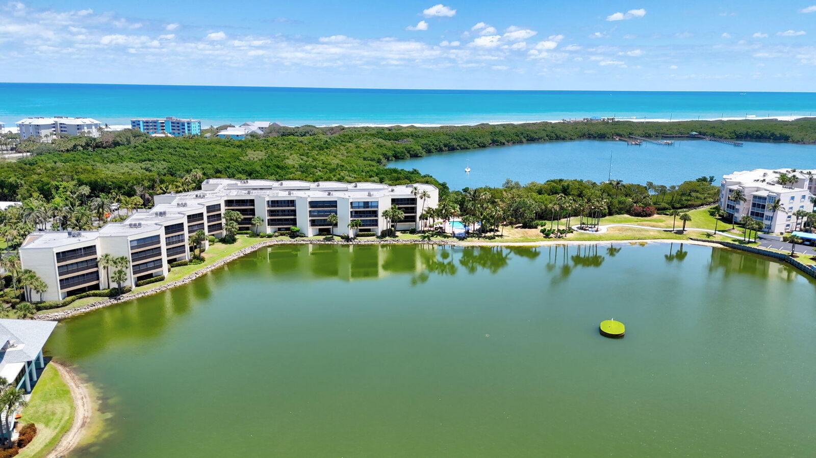 Property Photo:  221 NE Plantation Road 211  FL 34996 