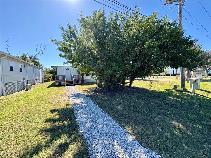 Property Photo:  5675 Pine Island Road NW  FL 33922 