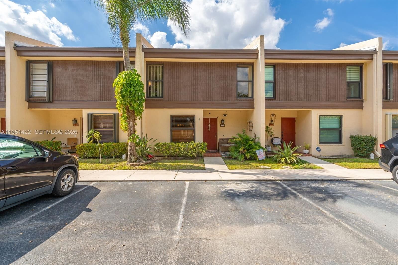 Property Photo:  1210 NW 99th Ave 66  FL 33024 