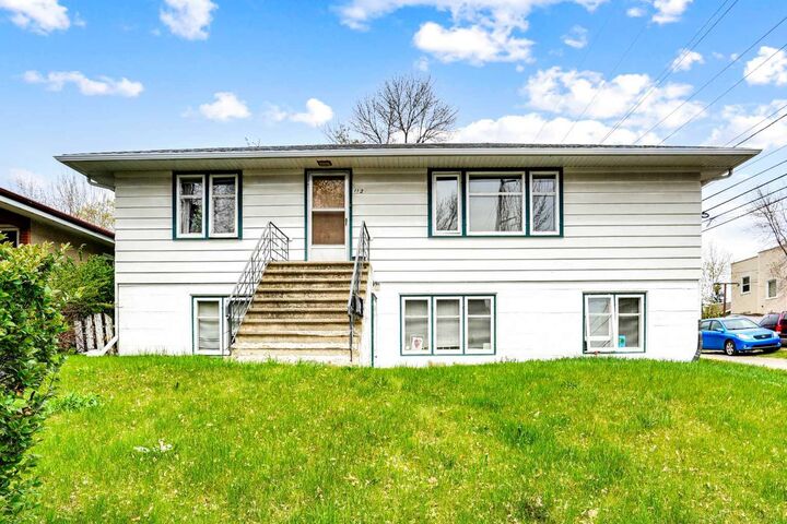 Property Photo:  112 29 Avenue NW  AB T2M 2L8 