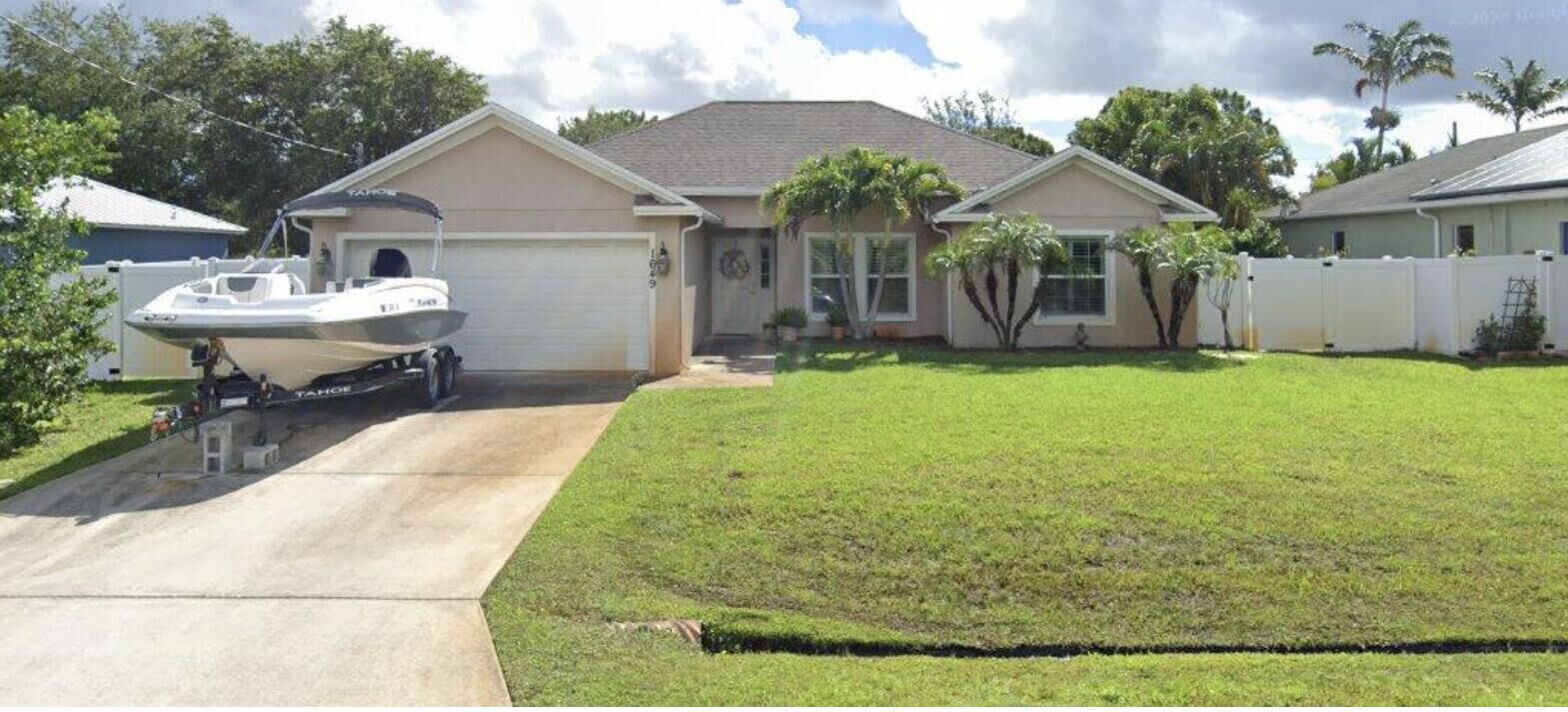 Property Photo: 1649 SW Hampshire Lane FL 34953