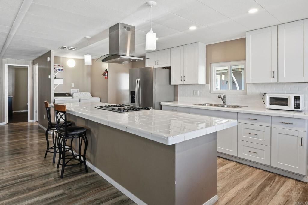 Property Photo: 8701 Mesa Road 77 CA 92071