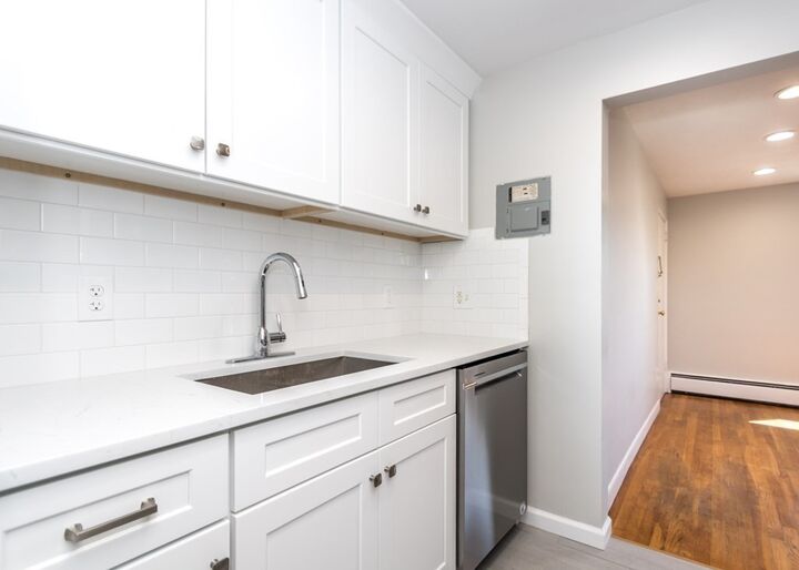 Property Photo:  182-1/2 River St 182H  MA 02453 