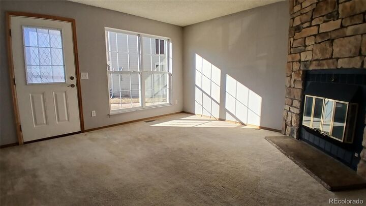 Property Photo:  1699 S Trenton Street 13  CO 80231 