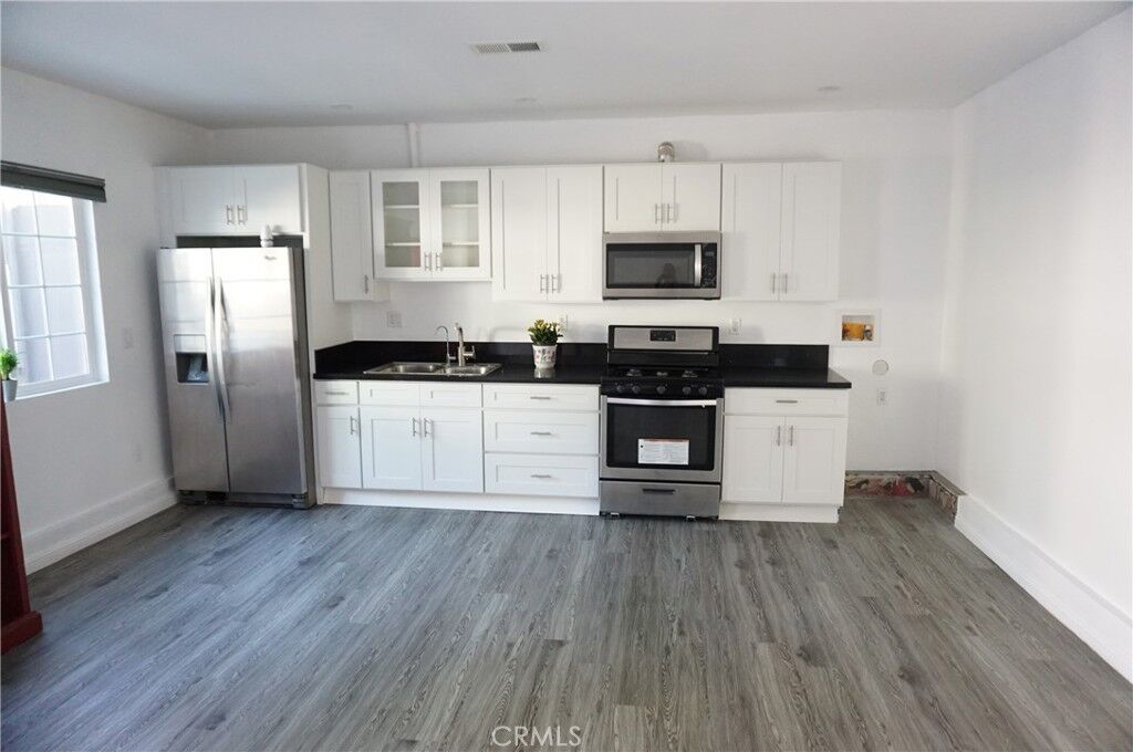 Property Photo:  14820 Devonshire Street  CA 91345 