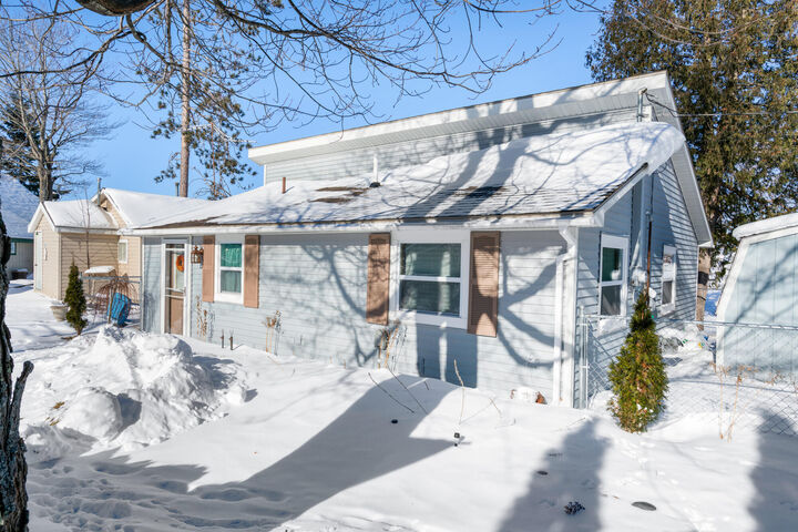 Property Photo:  1012 Lynn Drive  MI 49749 