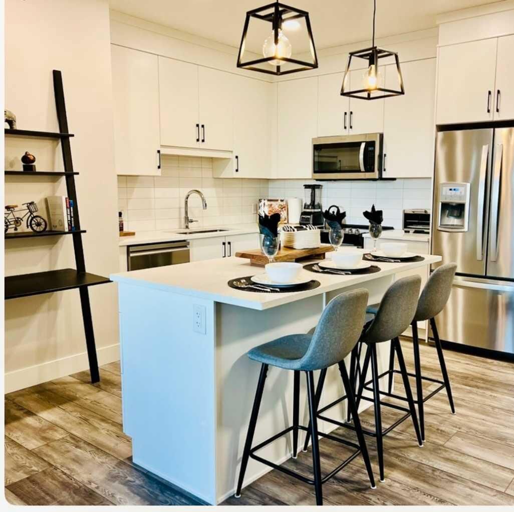 Property Photo: 8355 19 Avenue SW 110 AB T3H 6G3