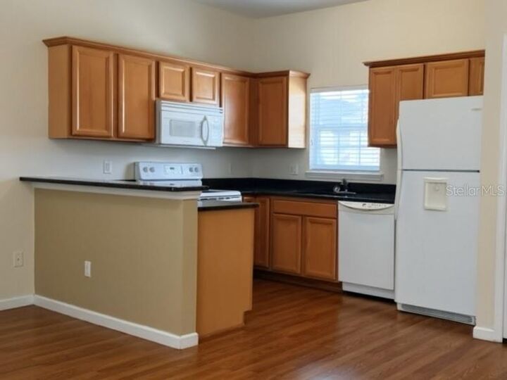 Property Photo:  823 Oak Shadows Road B  FL 34747 