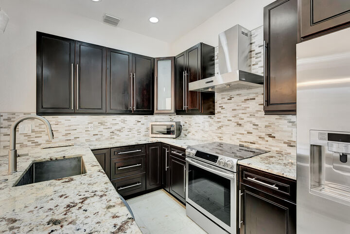 Property Photo: 406 NW 25th Avenue FL 33426