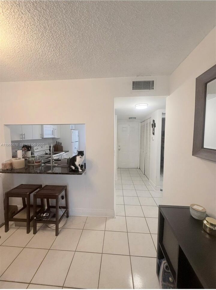 Property Photo:  10541 NW 10th St 103  FL 33026 