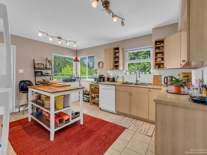 Property Photo: 4865 11A Avenue BC V4M 1Z5