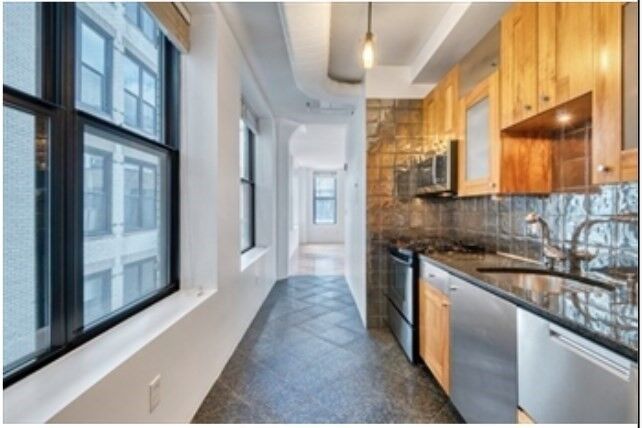 Property Photo:  449-463 Washington 7D  MA 02111 