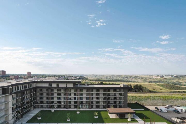 Property Photo: 102 Scenic Drive N 210 AB T1H 5L9