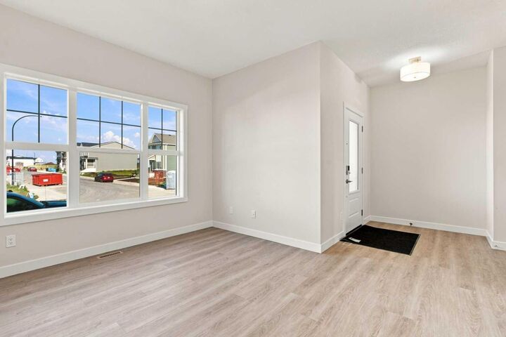 Property Photo: 76 Buffaloberry Manor SE AB T3M 4A4
