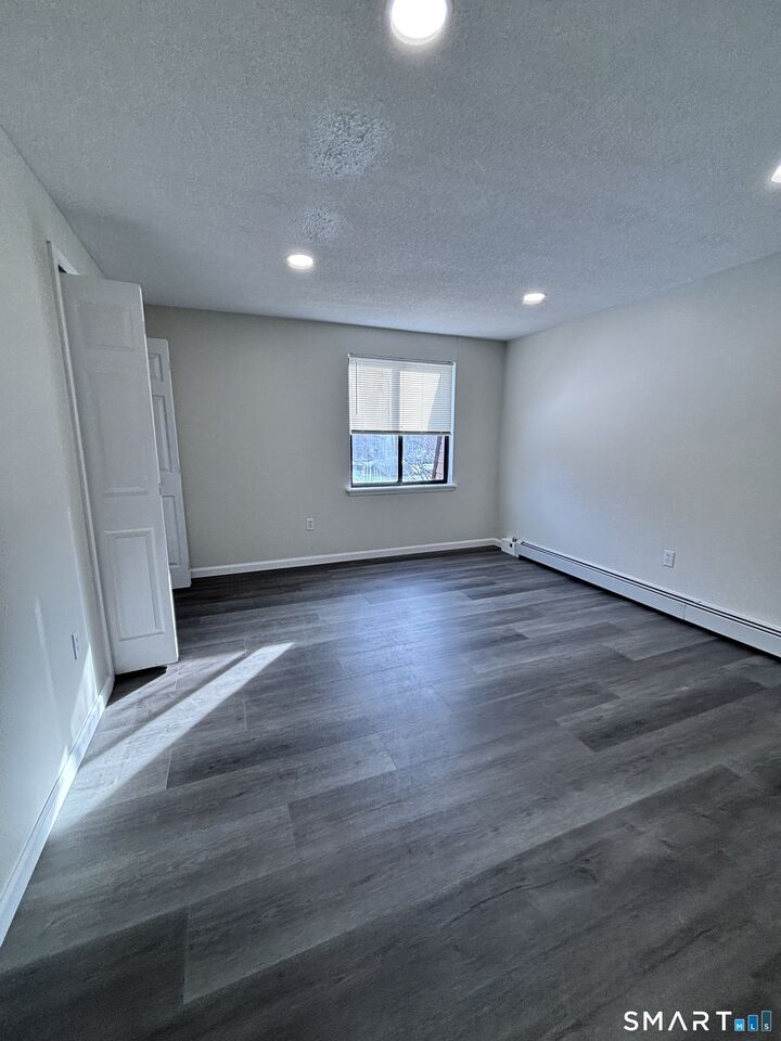 Property Photo:  11 King Arthur Drive 1B  CT 06357 