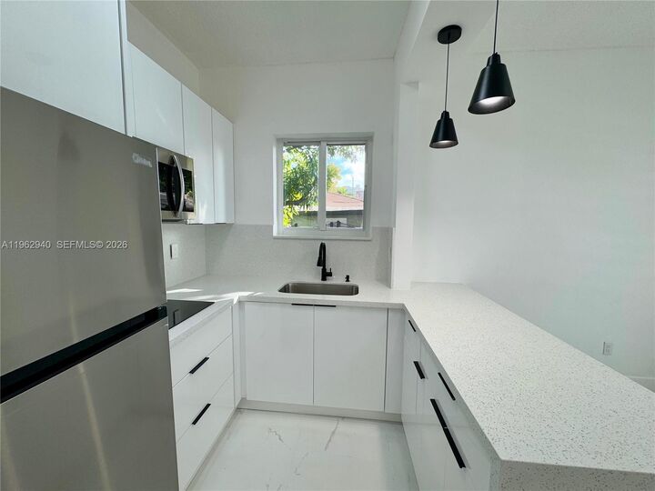 Property Photo: 421 NW 13th Ave B FL 33125