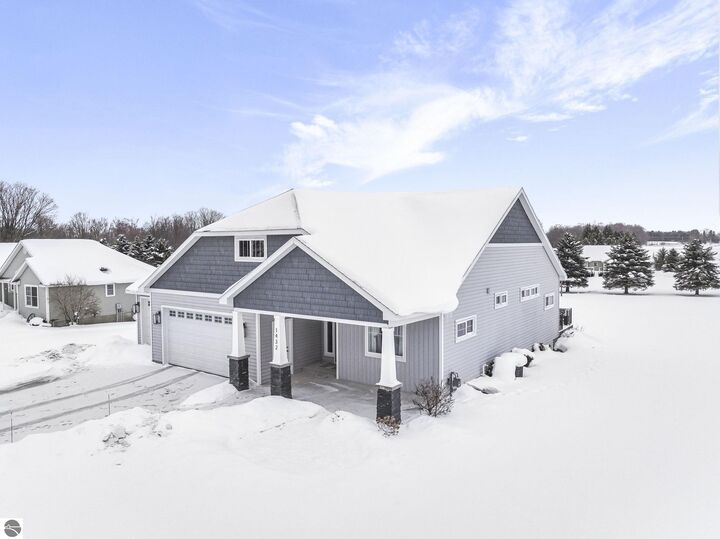 Property Photo:  1432 Bee Court  MI 49696 