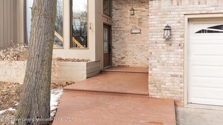 Property Photo:  1986 Thistlewood Road  MI 48864 