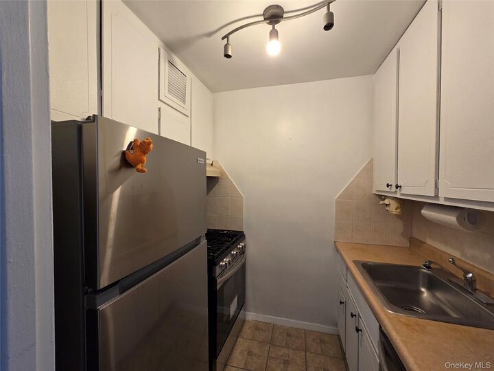 Property Photo:  18-15 215th Street 6 C  NY 11360 