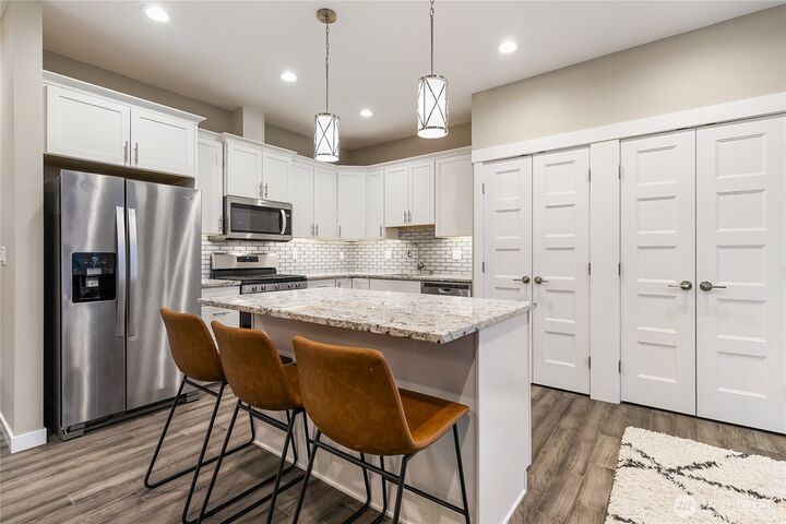 Property Photo: 5683 Sunstone Place 102 WA 98248