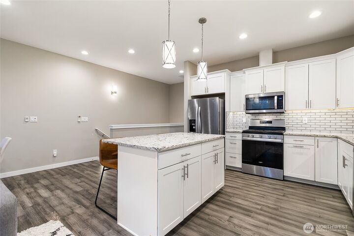 Property Photo:  5683  Sunstone Place 102  WA 98248 