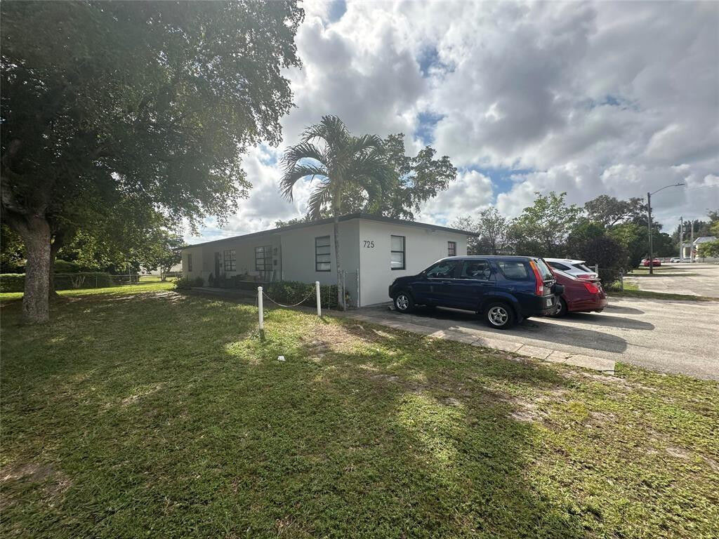 Property Photo:  725 NW 1st Court  FL 33009 