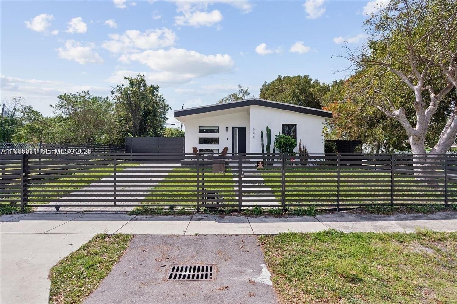 Property Photo:  944 NW 64th St  FL 33150 