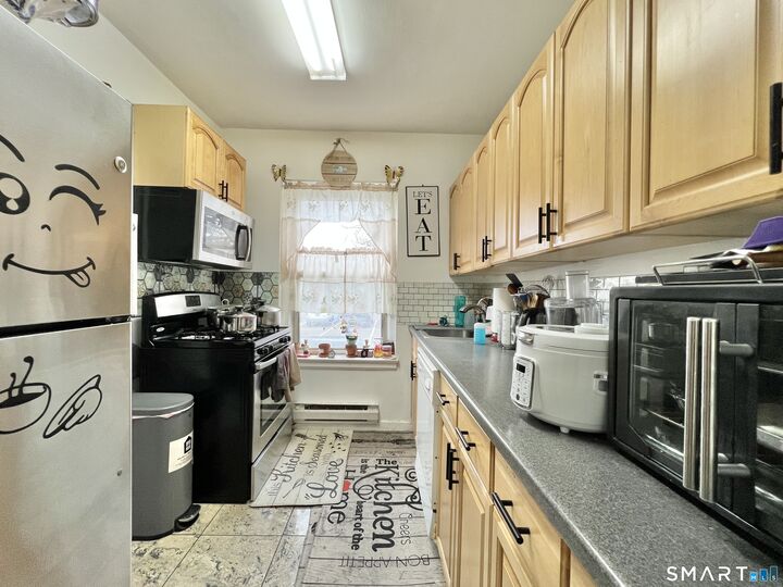 Property Photo: 118 Woodside Green 1A CT 06905