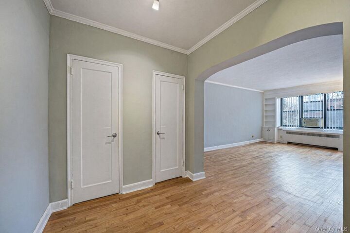 Property Photo:  1 Town House Place 3H  NY 11021 