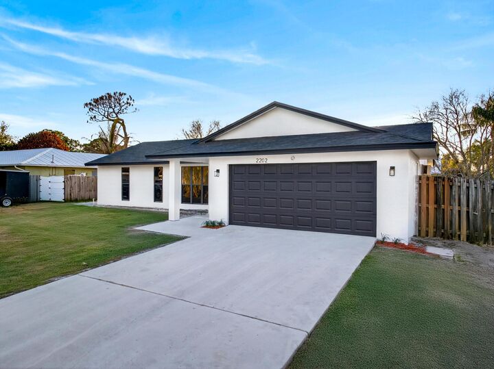 Property Photo: 2202 SE Glover Street FL 34984