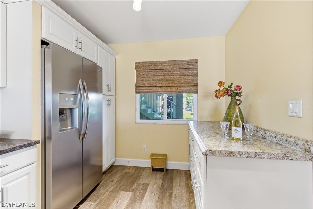 Property Photo:  7736 Jewel Lane W103  FL 34109 