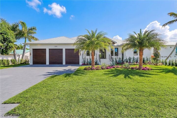 Property Photo: 2393 Longboat Drive FL 34104